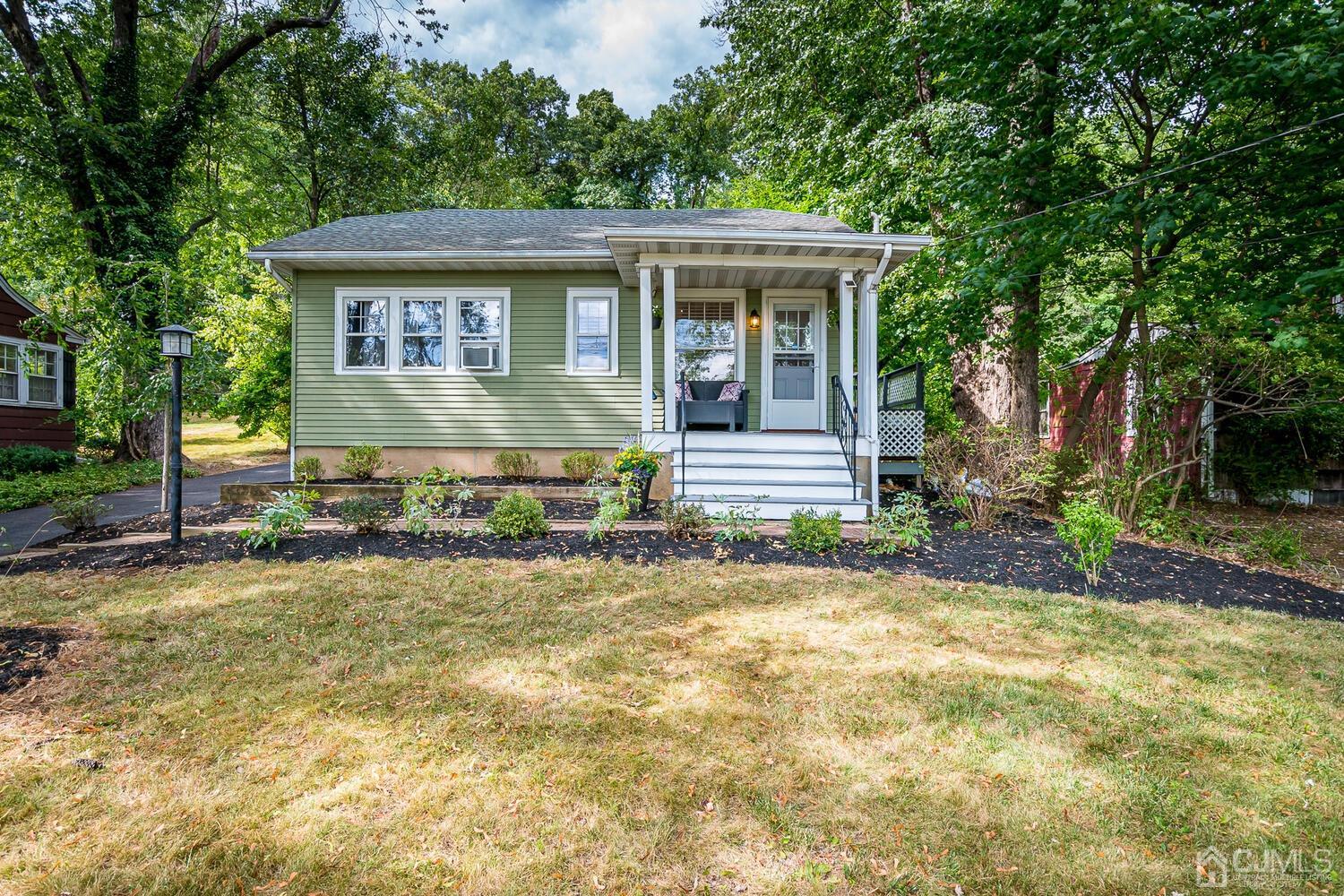 2015 Washington Valley Road Bridgewater, NJ 08836 - Photo 5 of 46 a front view of a house with a yard
