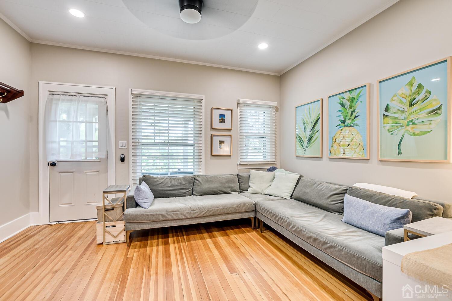 2015 Washington Valley Road Bridgewater, NJ 08836 - Photo 9 of 46 a living room with furniture and a large window