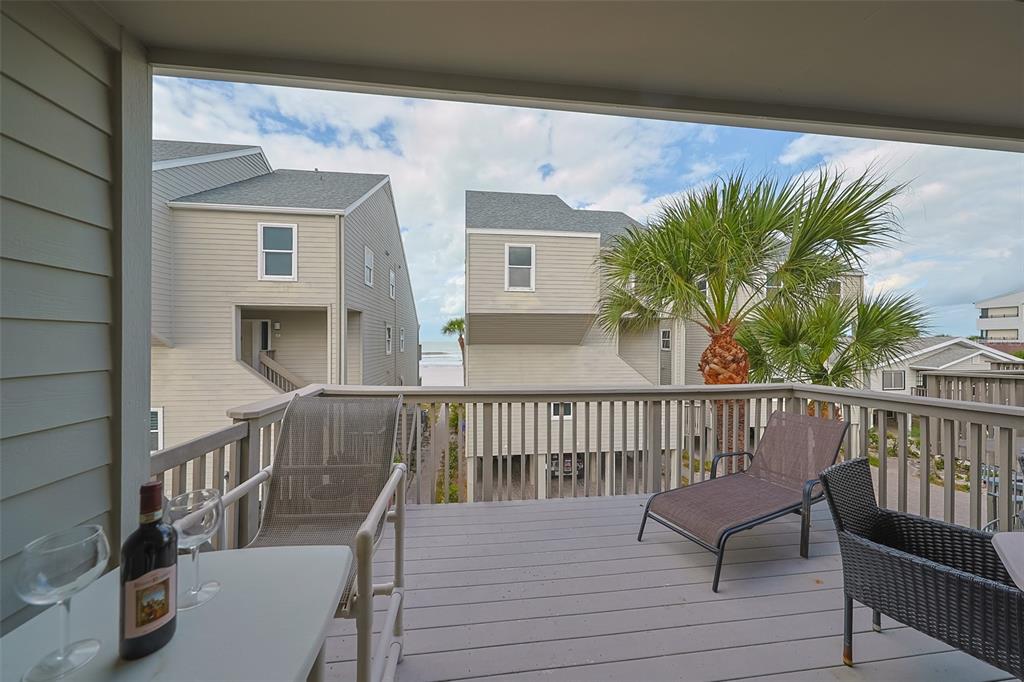 19930 Gulf Boulevard, Unit 1B Indian Shores, FL 33785 - Photo 22 of 26 a view of balcony with furniture