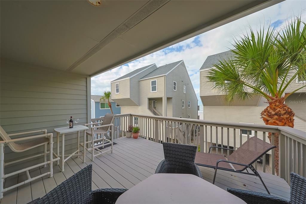 19930 Gulf Boulevard, Unit 1B Indian Shores, FL 33785 - Photo 23 of 26 a view of balcony with furniture