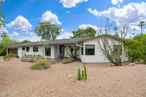 a front view of a house with patio
