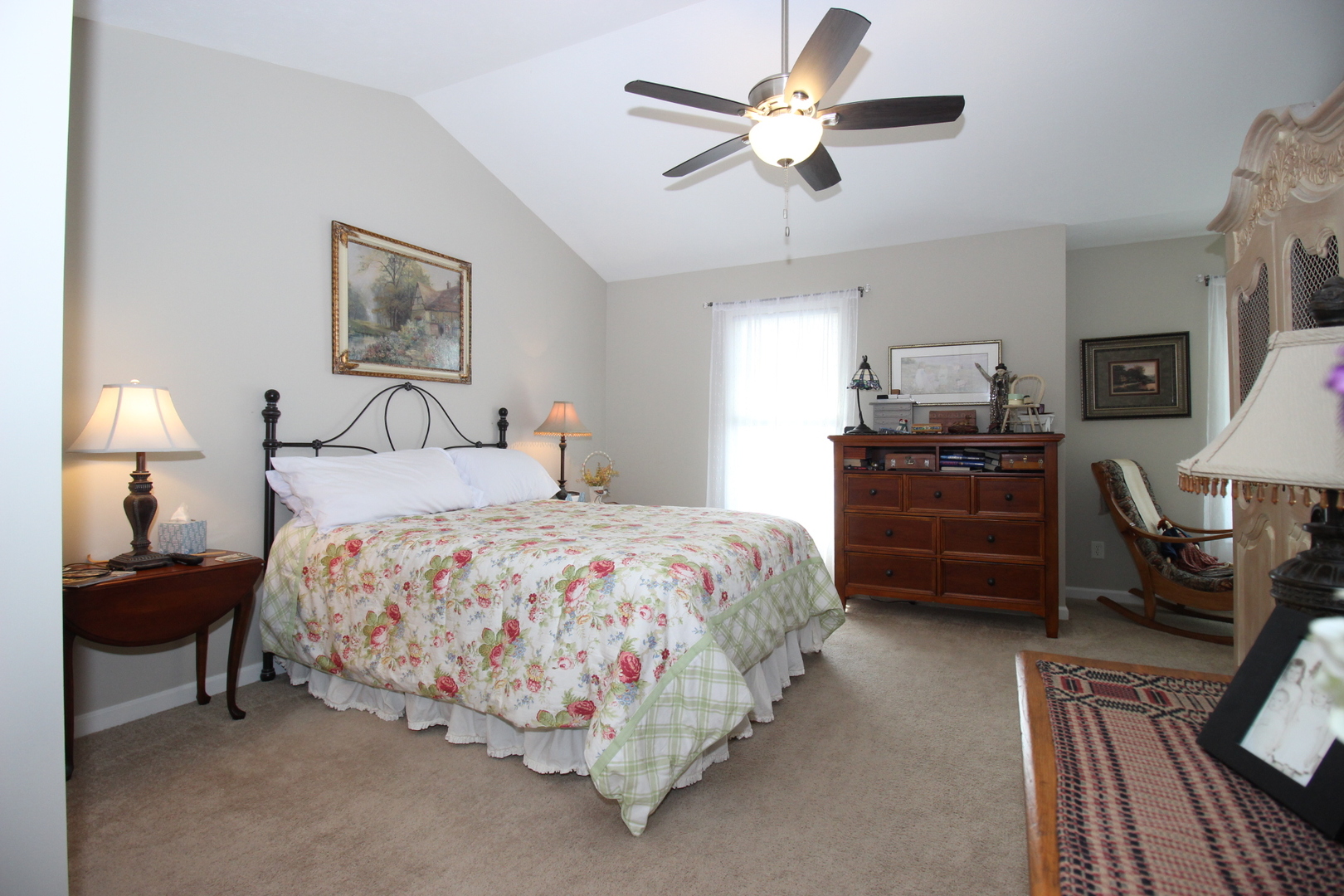 1409 Hull Street Normal, IL 61761 - Photo 16 of 29 a bedroom with a bed and a chandelier