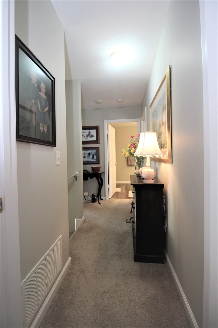 1409 Hull Street Normal, IL 61761 - Photo 20 of 29 a room with furniture and a window