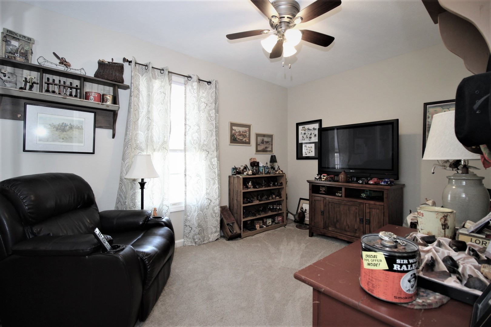 1409 Hull Street Normal, IL 61761 - Photo 21 of 29 a living room with furniture and a flat screen tv