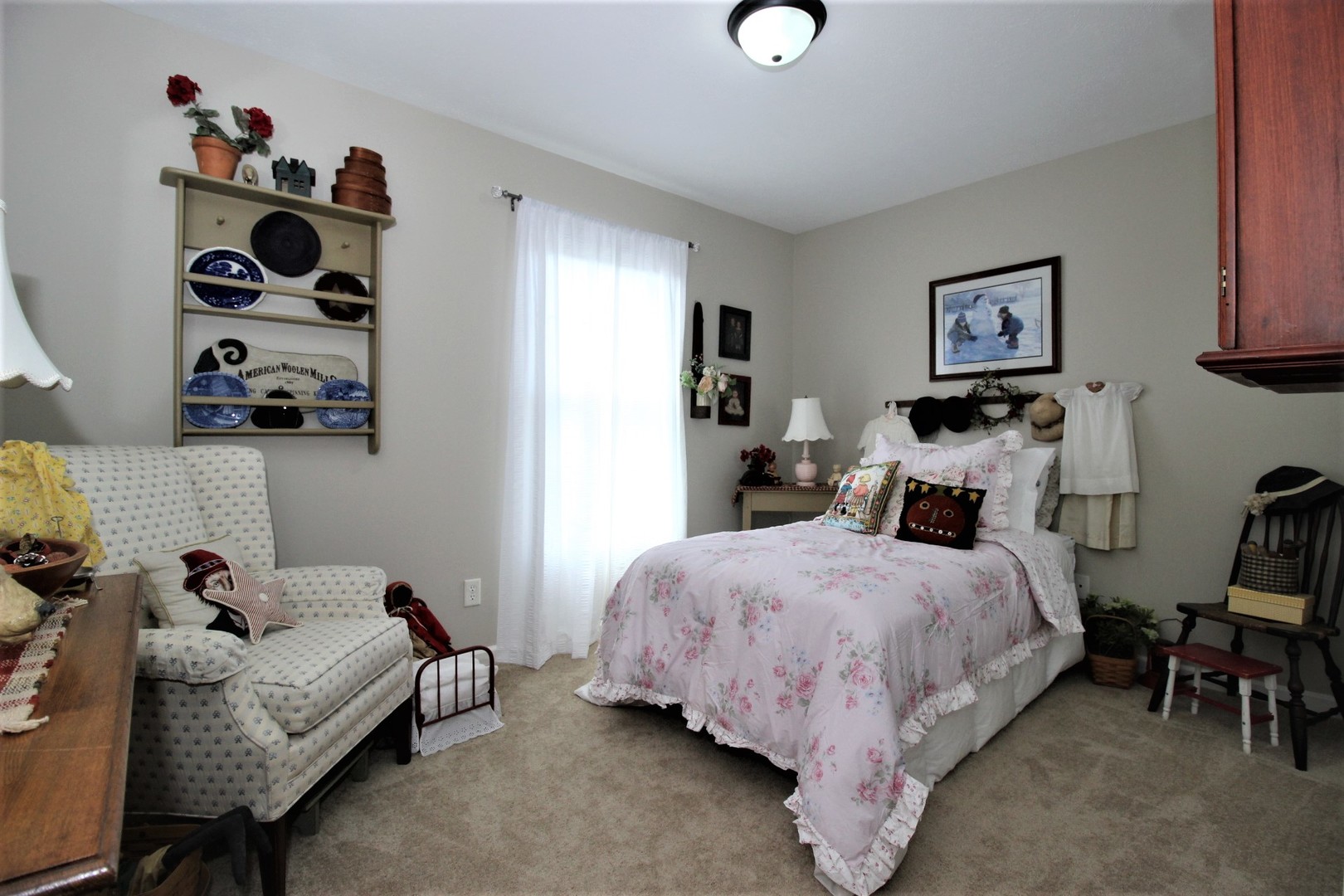 1409 Hull Street Normal, IL 61761 - Photo 25 of 29 a bedroom with a bed and cabinets