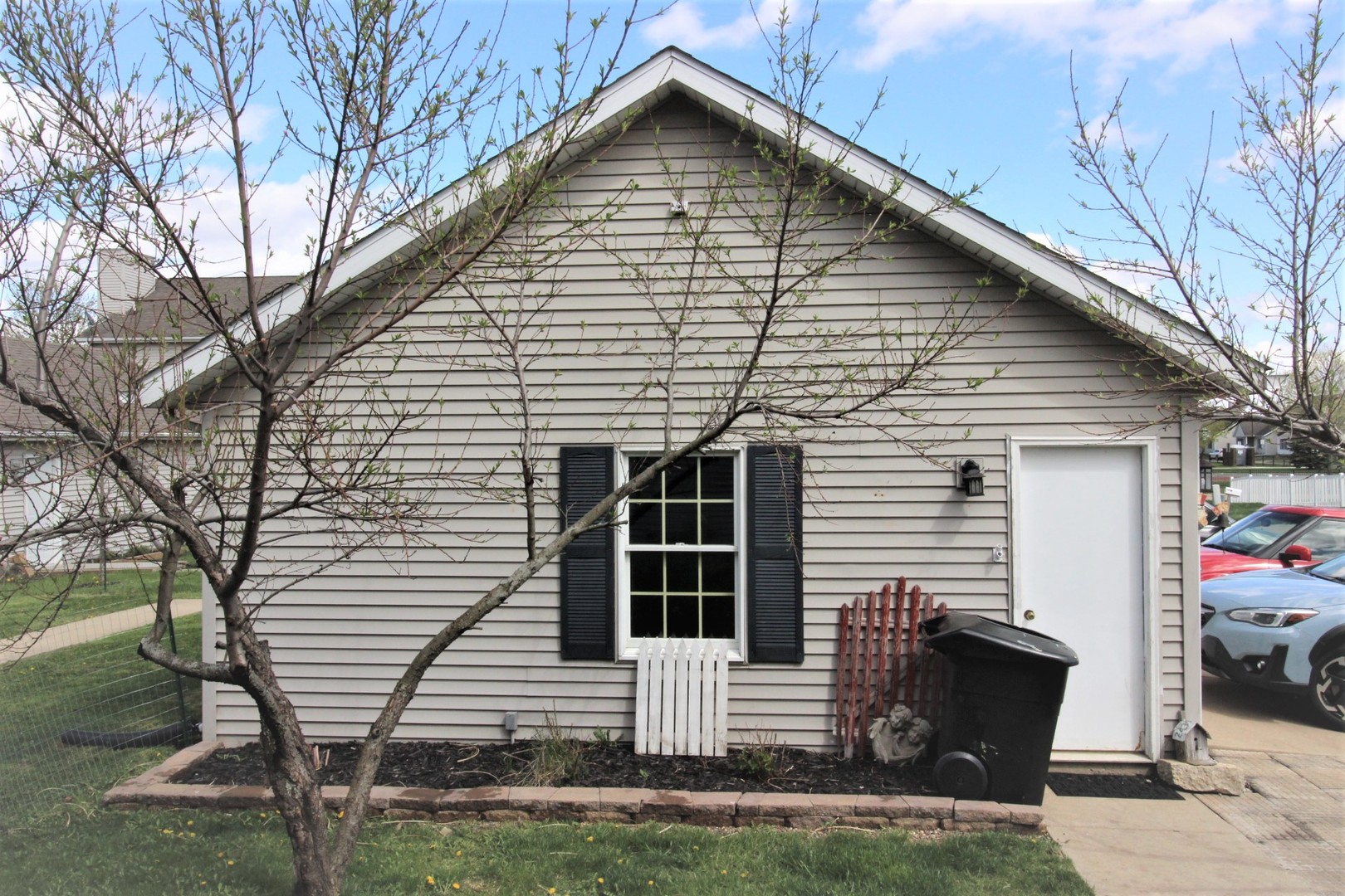 1409 Hull Street Normal, IL 61761 - Photo 29 of 29 a front view of a house with garage