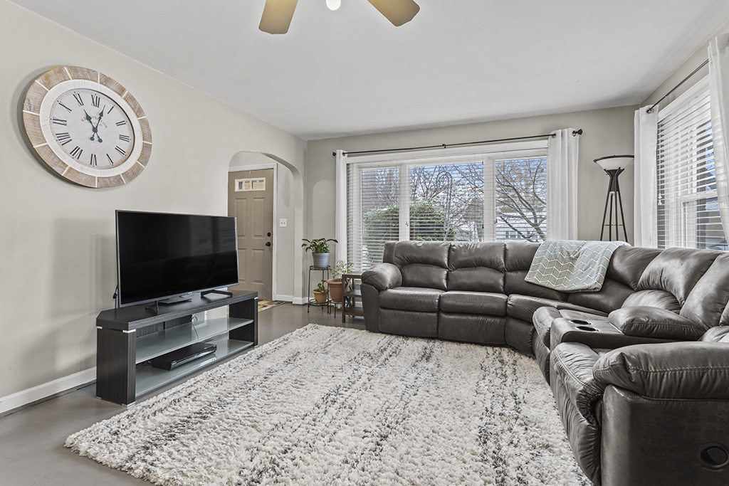 818 East 11th Street Lockport, IL 60441 - Photo 4 of 13 a living room with furniture and a flat screen tv