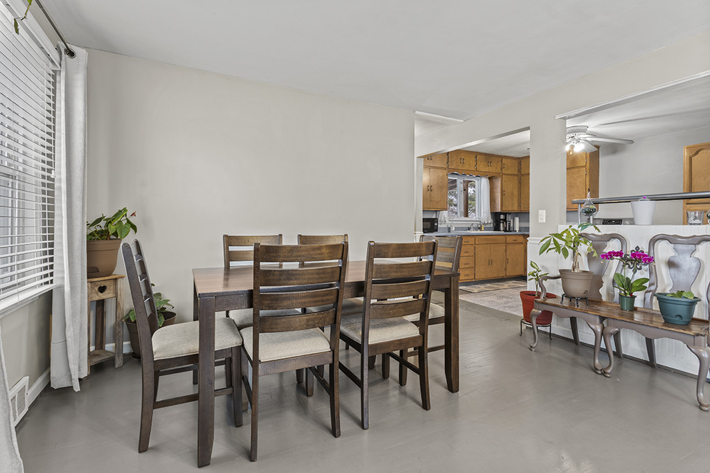 818 East 11th Street Lockport, IL 60441 - Photo 6 of 13 a view of a dining room with furniture and a potted plant