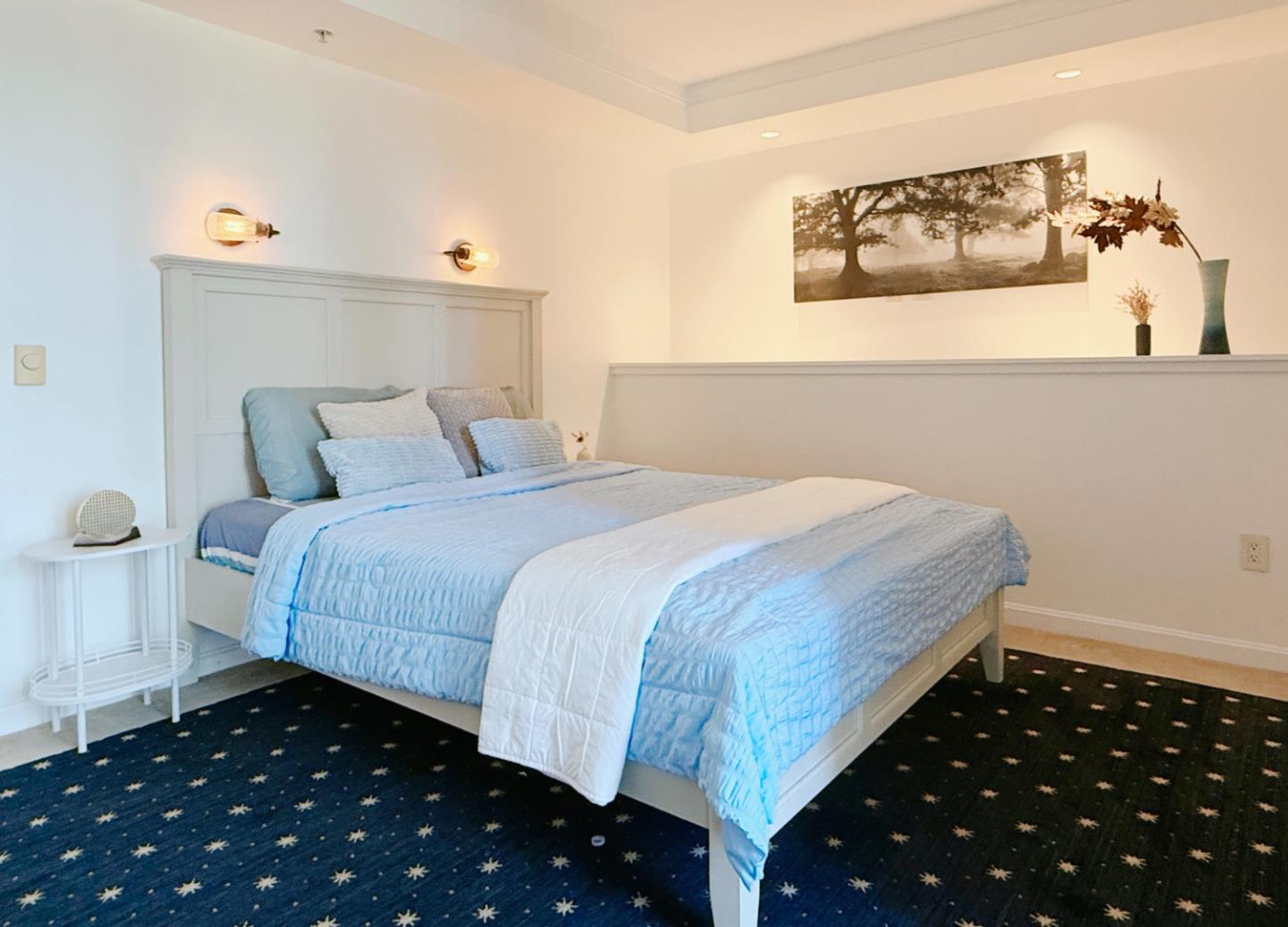 400 Beale Street, Unit 1102 San Francisco, CA 94105 - Photo 15 of 26 a bedroom with bed and window