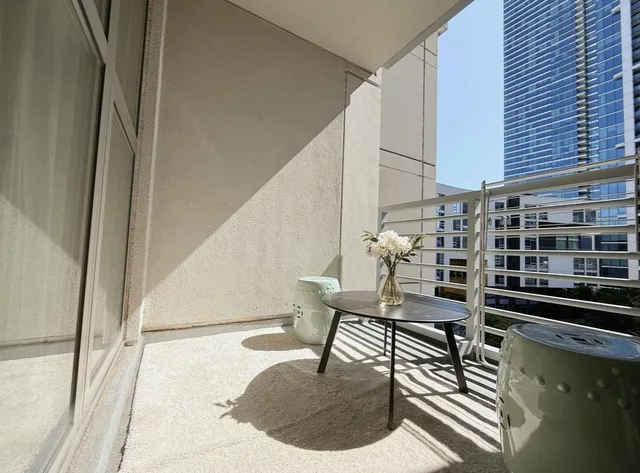 a reading room with furniture and wooden floor