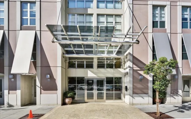 a front view of a building with a street