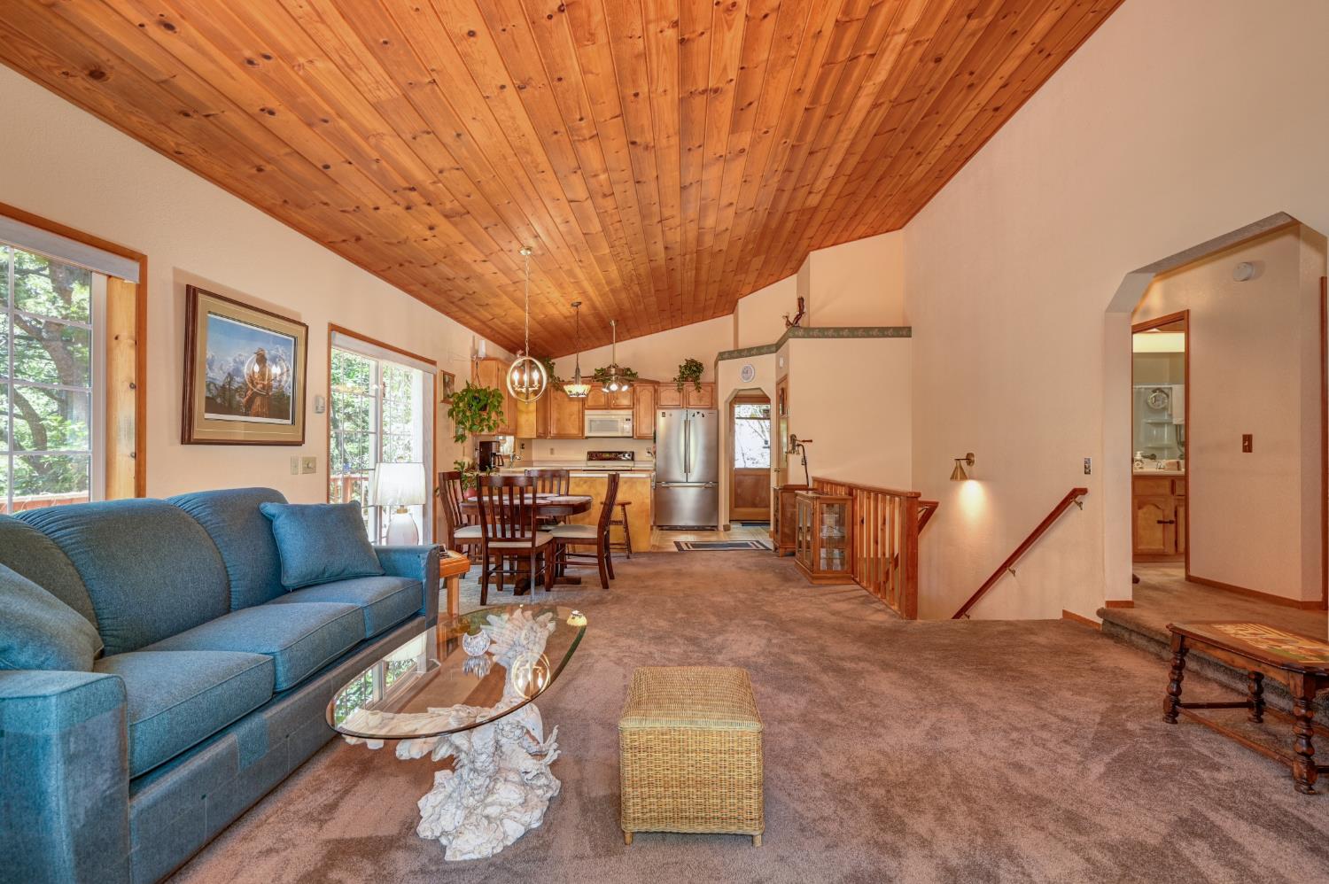 23998 Stable Road Sonora, CA 95370 - Photo 8 of 41 a living room with furniture and a wooden floor