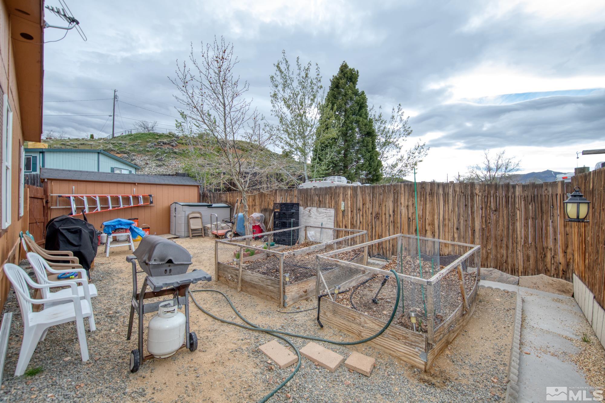 4963 Newport Court Reno, NV 89506 - Photo 18 of 19 a view of an outdoor sitting area with furniture