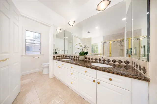 a bathroom with a tub and a shower