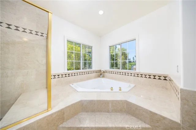 a view of a backyard with sitting area