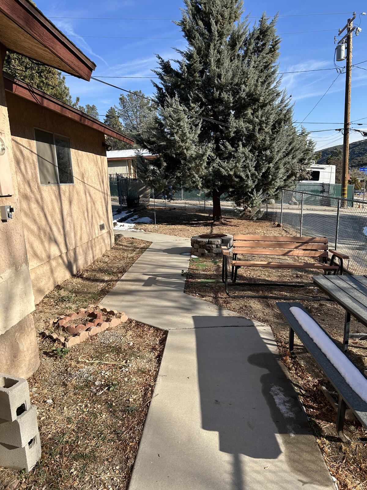 43729 Lakeview Road Lake Hughes, CA 93532 - Photo 16 of 16 a view of a backyard with wooden floor and outdoor space