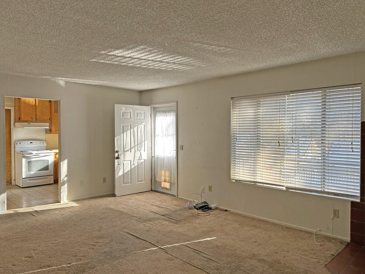 43729 Lakeview Road Lake Hughes, CA 93532 - Photo 5 of 16 a view of an empty room with a window