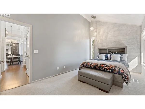 a living room with a bed and gym equipment