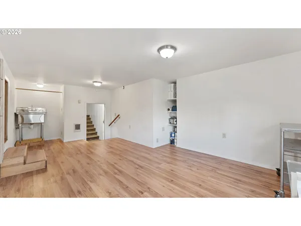 a room with a bed and a cabinets
