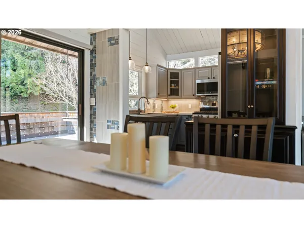 a open kitchen with granite countertop a stove and a sink