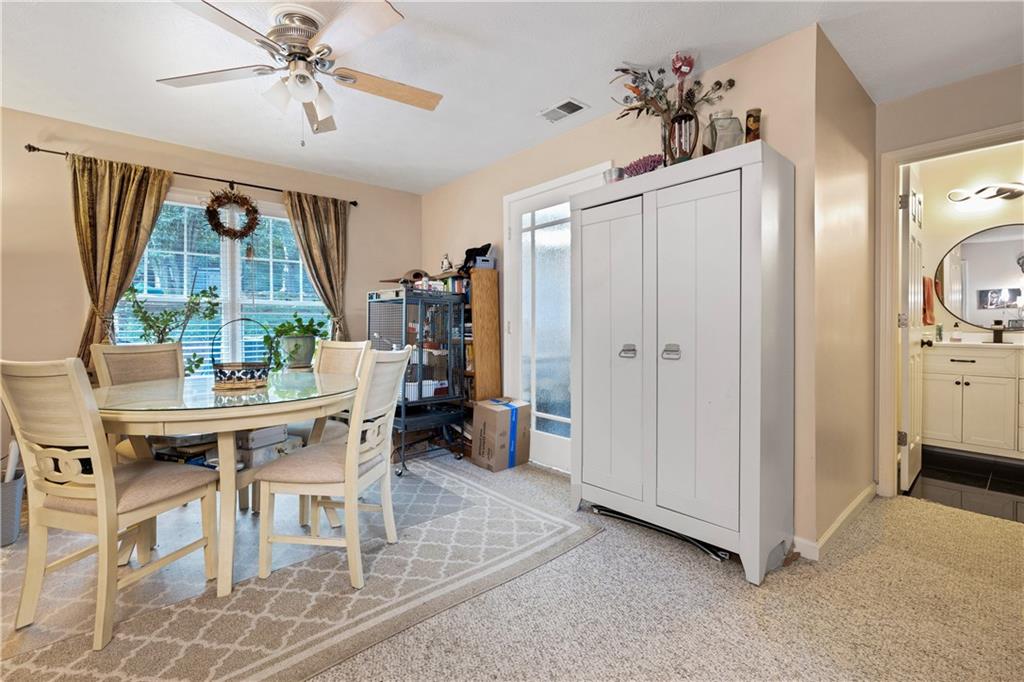 110 River Terrace Point Roswell, GA 30076 - Photo 11 of 24 a view of a livingroom with furniture and window