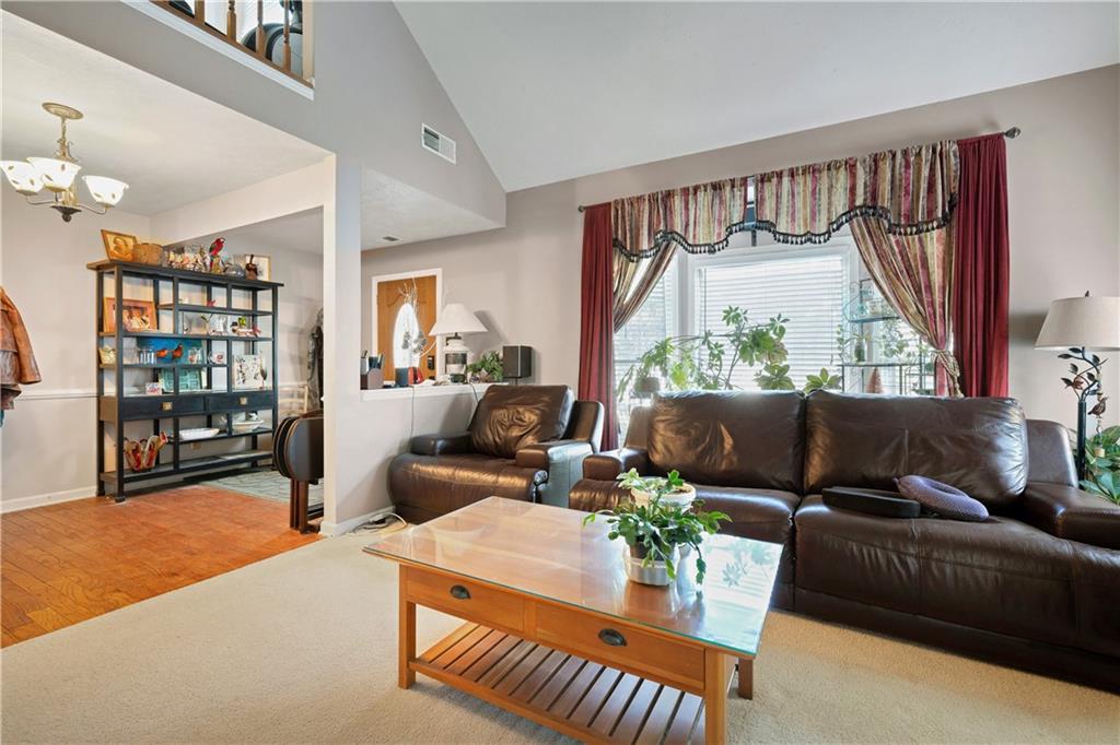 110 River Terrace Point Roswell, GA 30076 - Photo 6 of 24 a living room with furniture and a large window