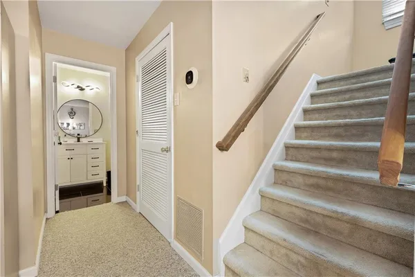 a view of entryway with wooden floor
