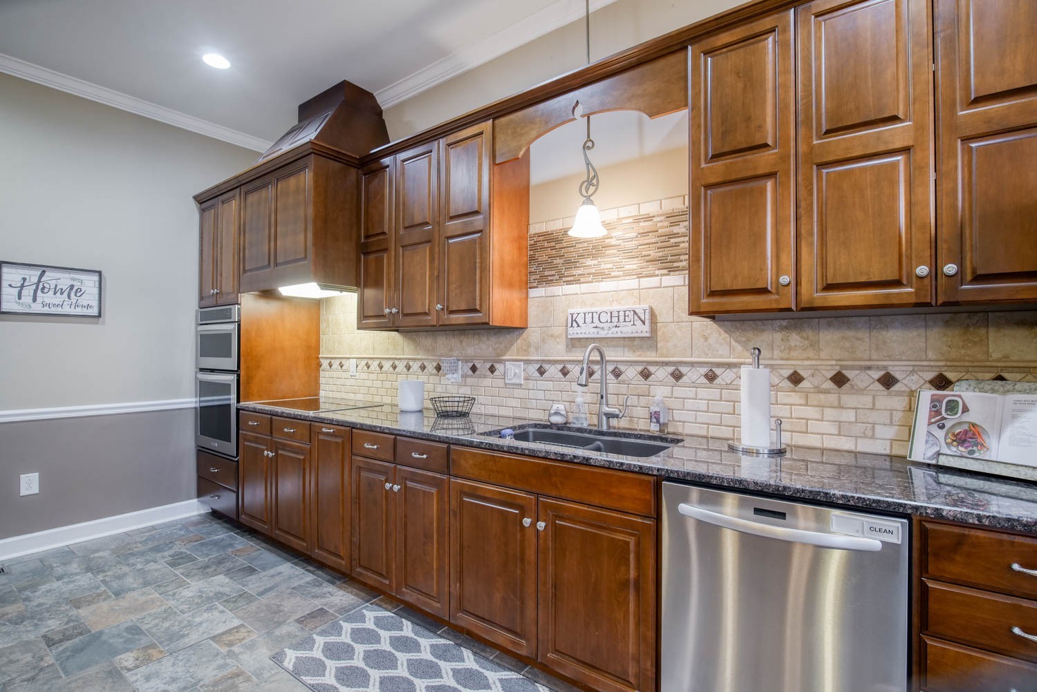 197 Turner Road Watertown, TN 37184 - Photo 20 of 65 a kitchen with stainless steel appliances granite countertop a sink stove and cabinets