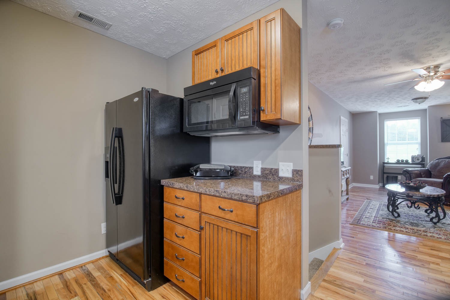 197 Turner Road Watertown, TN 37184 - Photo 36 of 65 a kitchen with stainless steel appliances granite countertop a refrigerator and a stove top oven