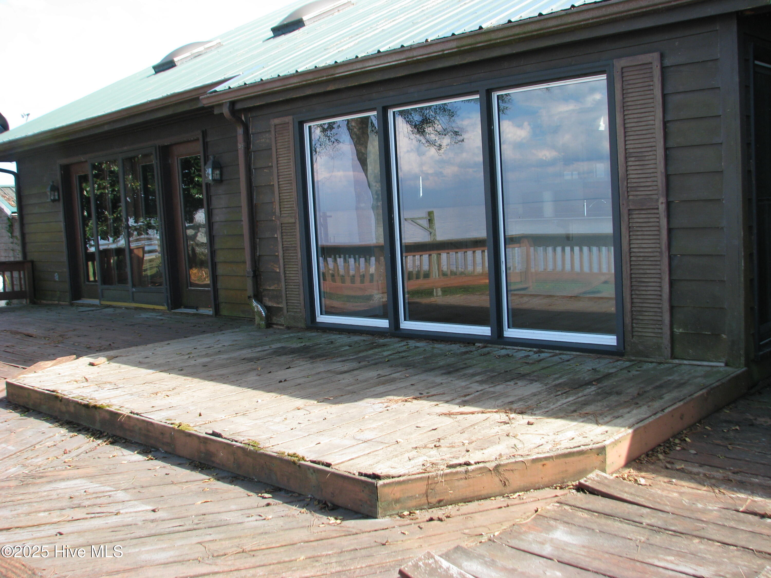 227 Rhodes Drive Columbia, NC 27925 - Photo 11 of 24 Back view from kitchen and great room