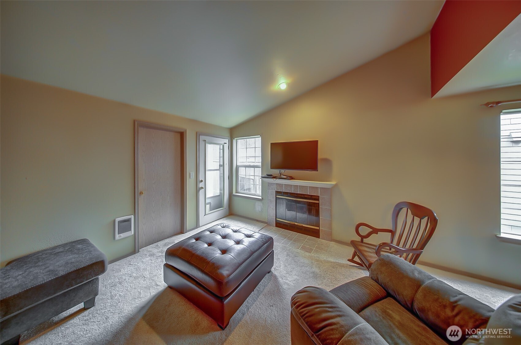 6001 Merlot Lane Southeast Lacey, WA 98513 - Photo 11 of 40 a living room with furniture and a flat screen tv