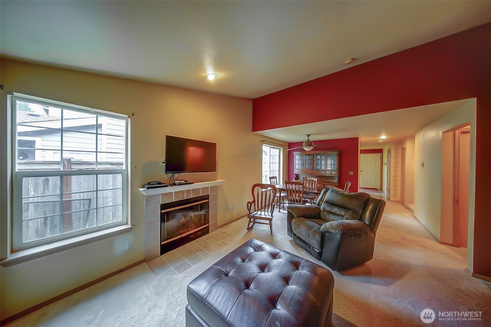 6001 Merlot Lane Southeast Lacey, WA 98513 - Photo 12 of 40 a living room with furniture and a flat screen tv