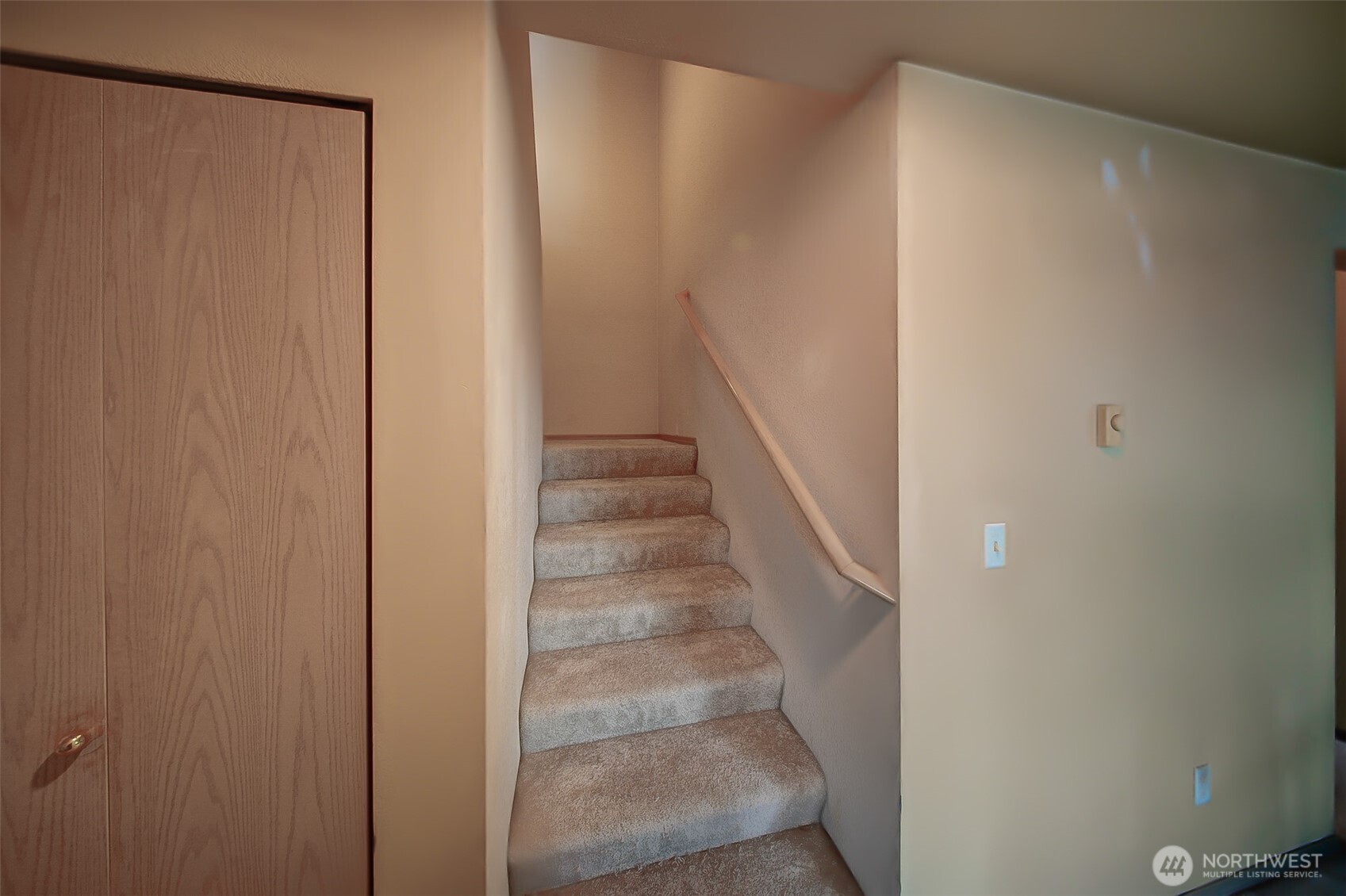 6001 Merlot Lane Southeast Lacey, WA 98513 - Photo 20 of 40 a view of staircase with white walls and white door