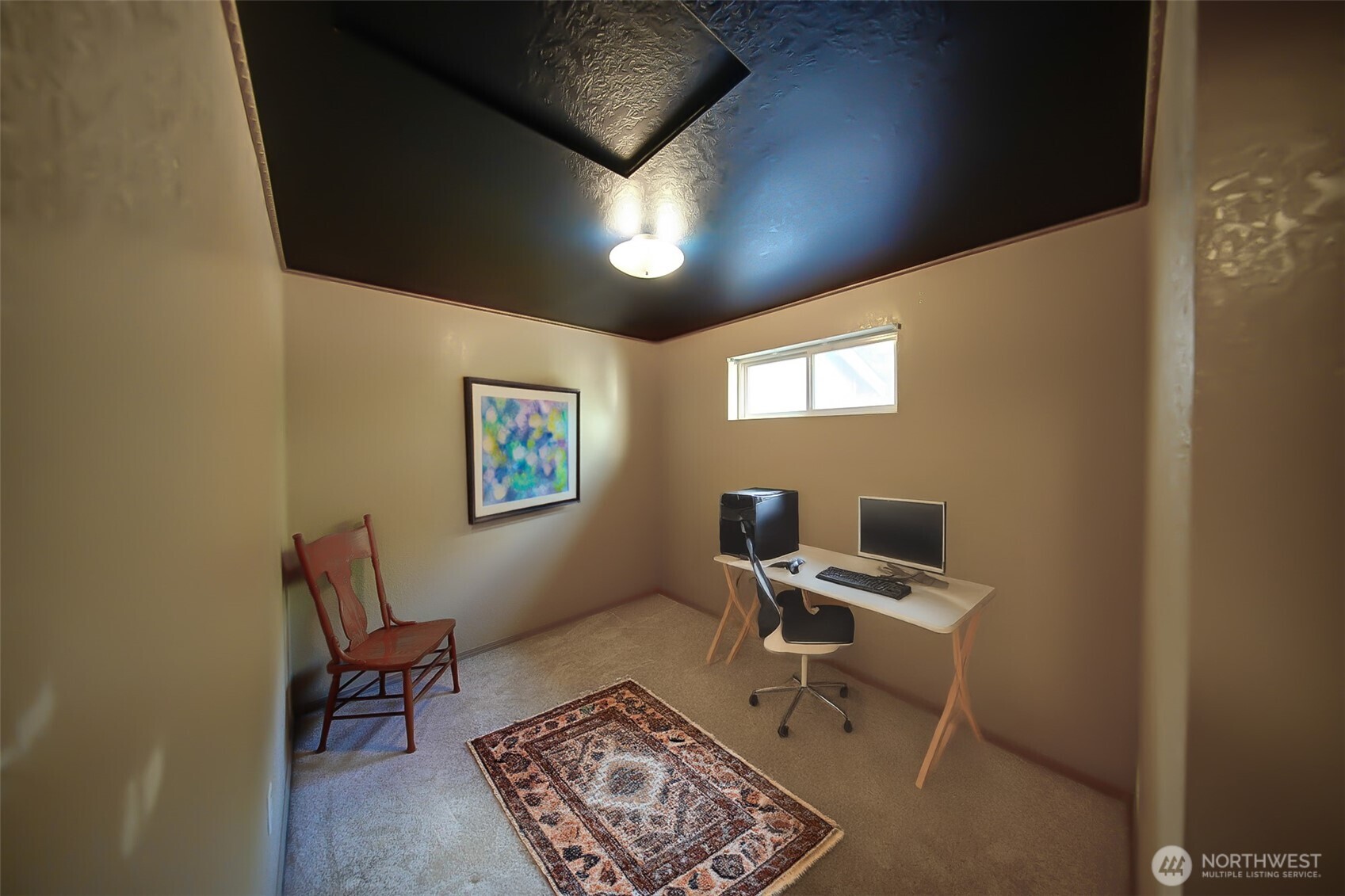 6001 Merlot Lane Southeast Lacey, WA 98513 - Photo 24 of 40 a work room with table and chair