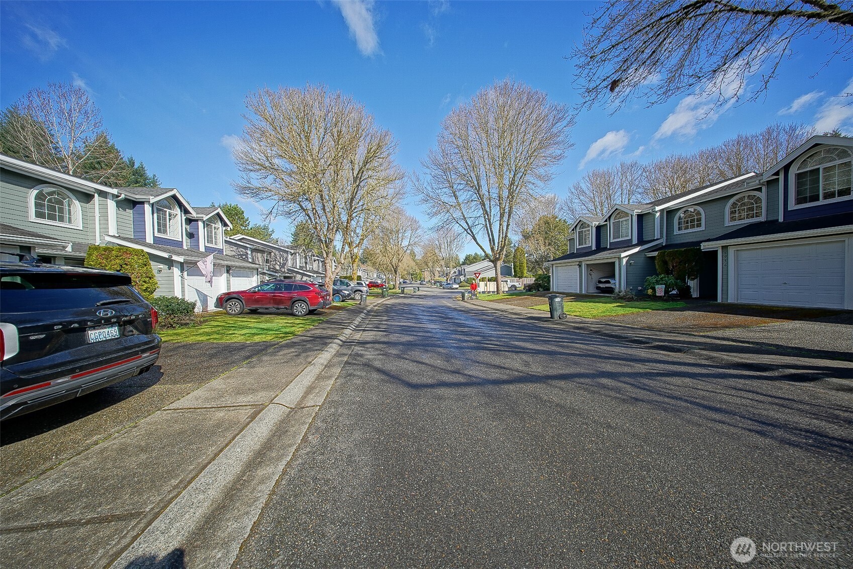 6001 Merlot Lane Southeast Lacey, WA 98513 - Photo 3 of 40 a view of street with parked cars