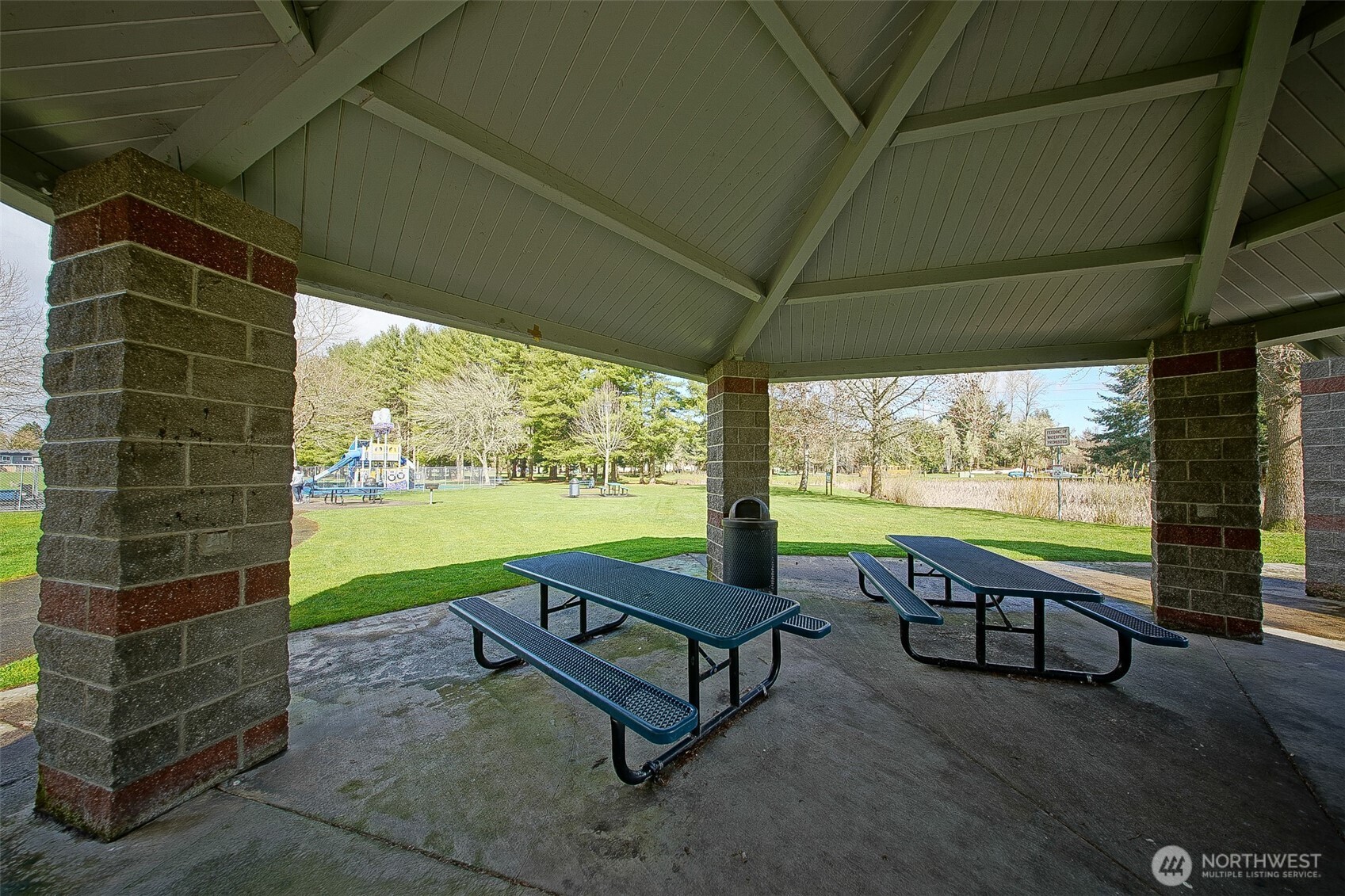 6001 Merlot Lane Southeast Lacey, WA 98513 - Photo 37 of 40 a building outdoor space with seating area and garden