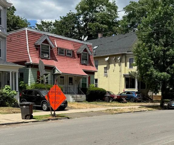 a view of a chairs and table in the house