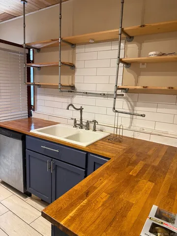 a bathroom with a sink and a shower