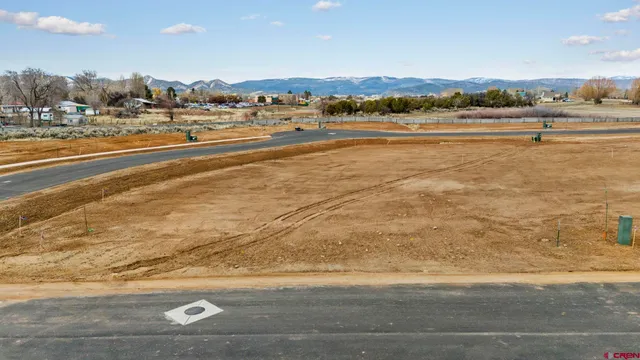 a view of an ocean and city