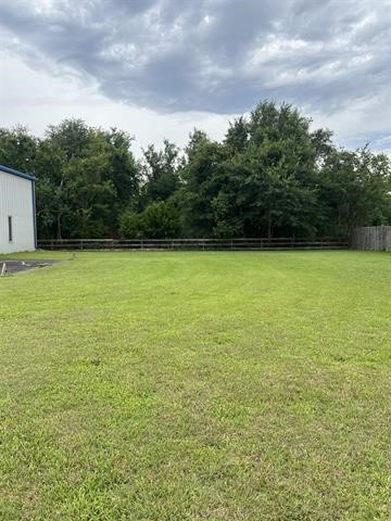 445 West Railroad Street China, TX 77613 - Photo 2 of 25 a view of a field with an outdoor space