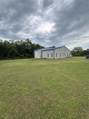 445 West Railroad Street China, TX 77613 - Photo 4 of 25 a view of a big room with an ocean and mountain view