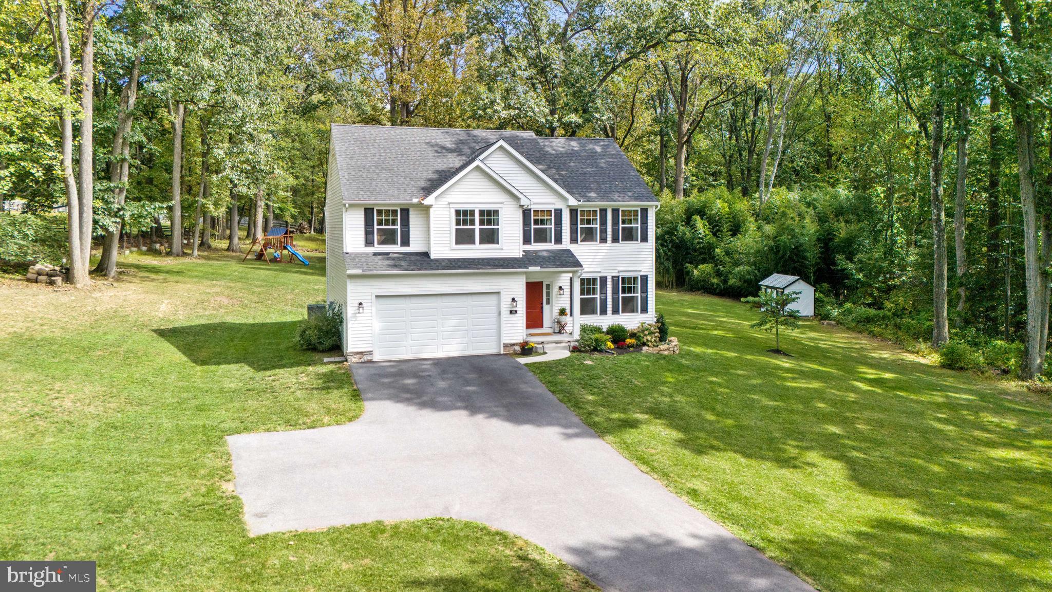 a view of house with outdoor space
