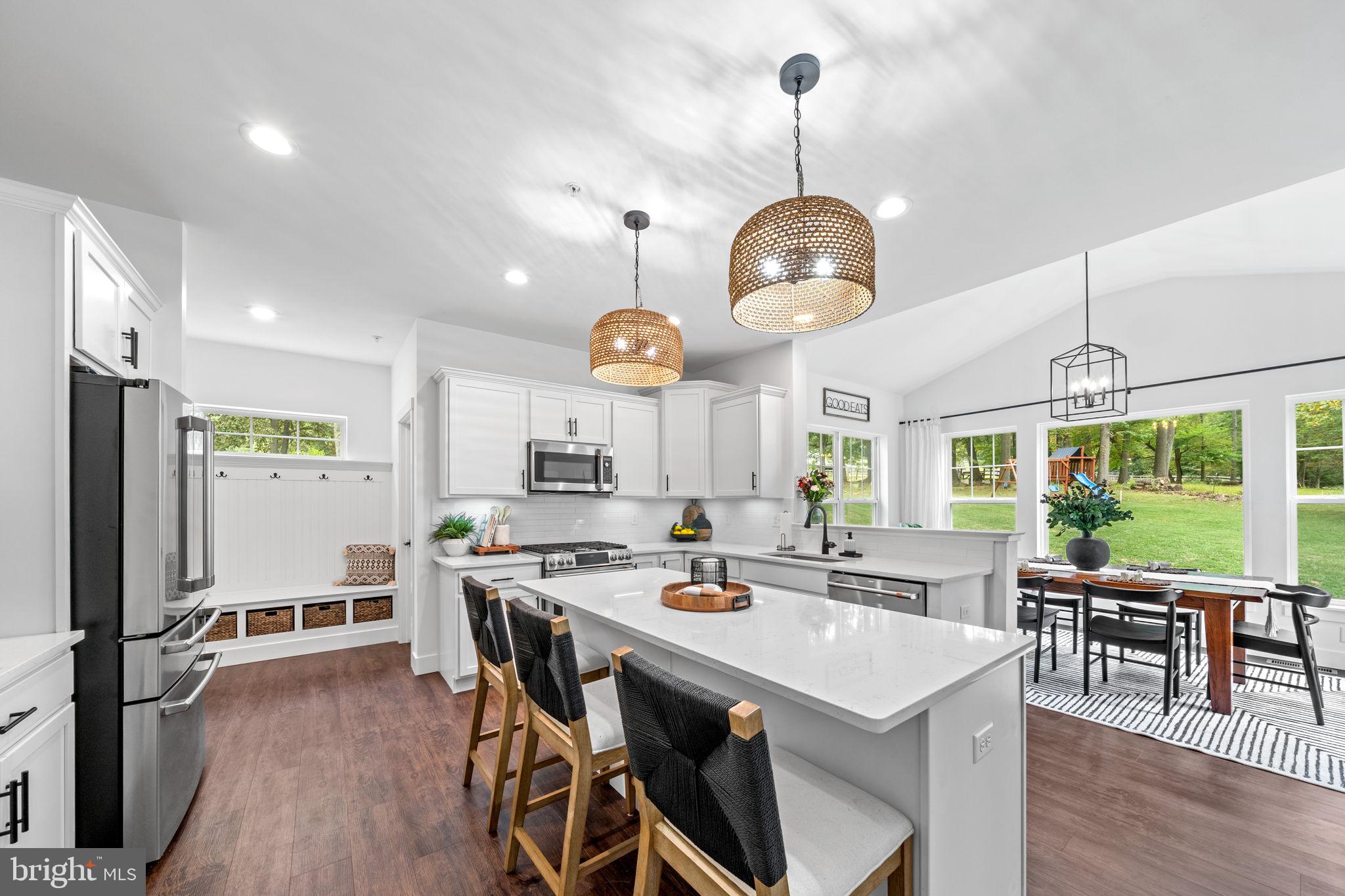 611 Grouse Road Exton, PA 19341 - Photo 13 of 59 a large kitchen with a table and chairs