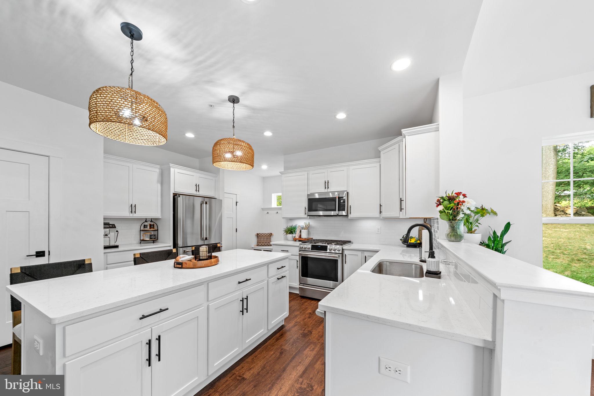 611 Grouse Road Exton, PA 19341 - Photo 16 of 59 a kitchen with cabinets and stainless steel appliances