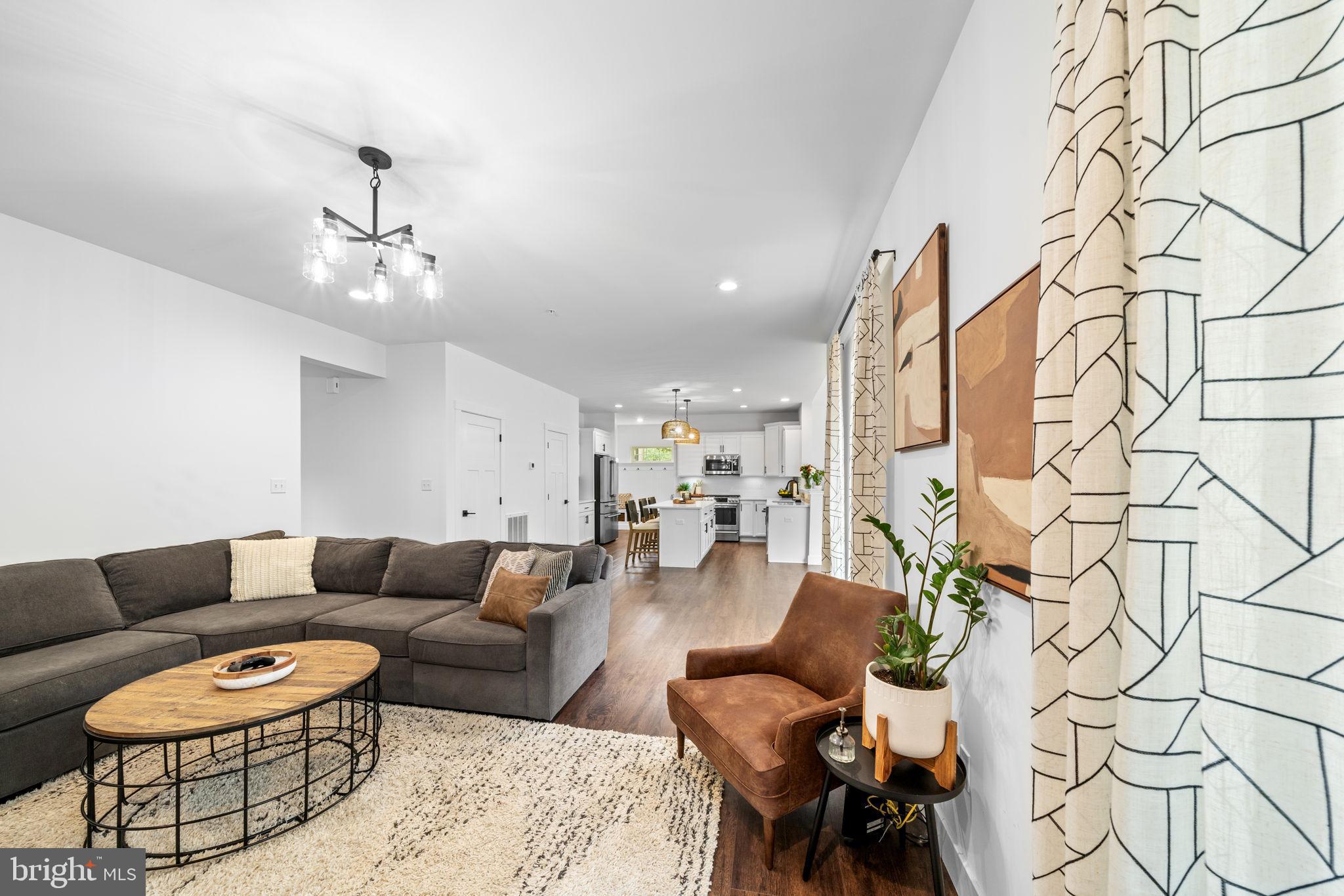 611 Grouse Road Exton, PA 19341 - Photo 22 of 59 a living room with furniture and wooden floor