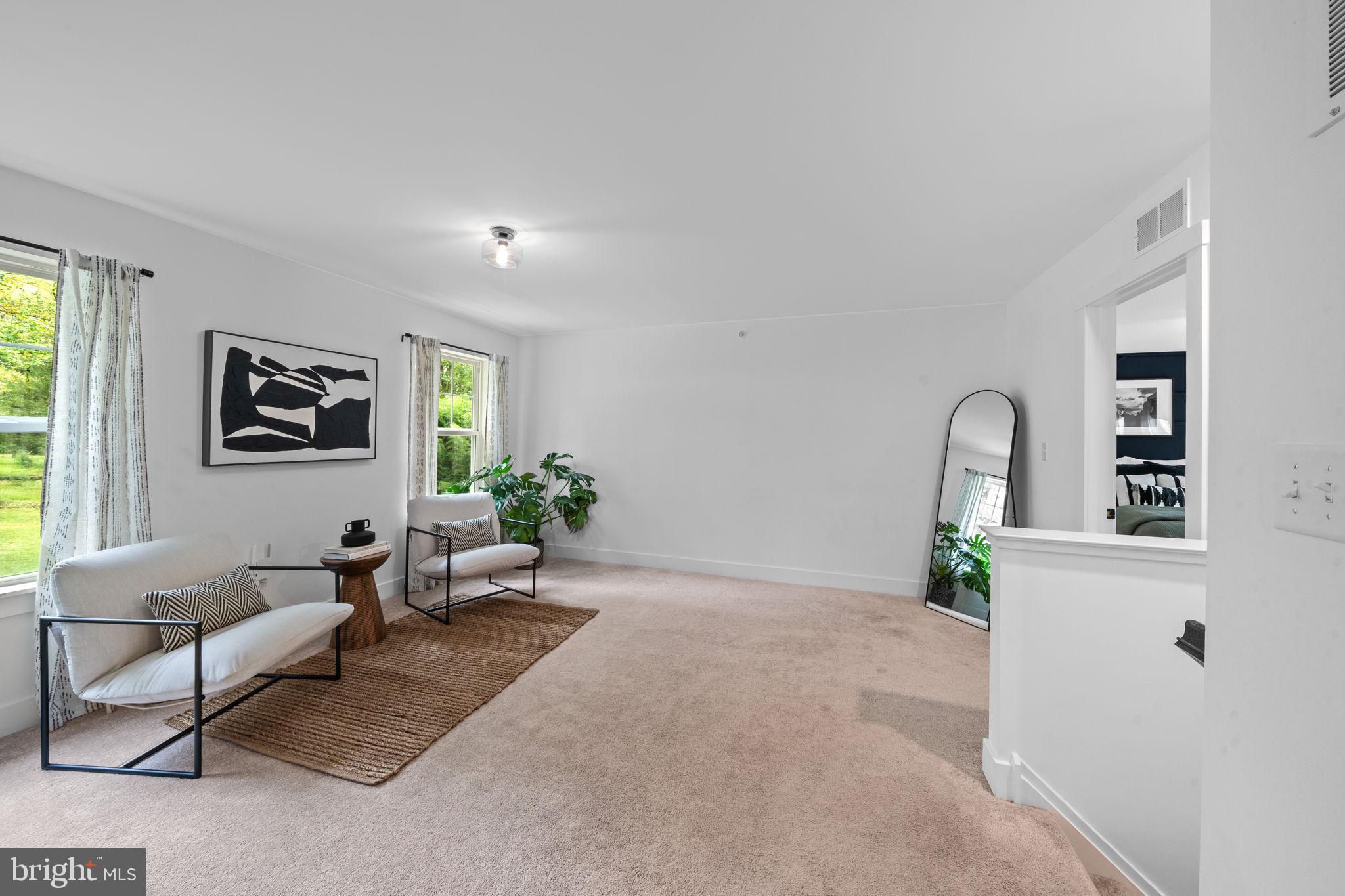 611 Grouse Road Exton, PA 19341 - Photo 24 of 59 a living room with furniture and window