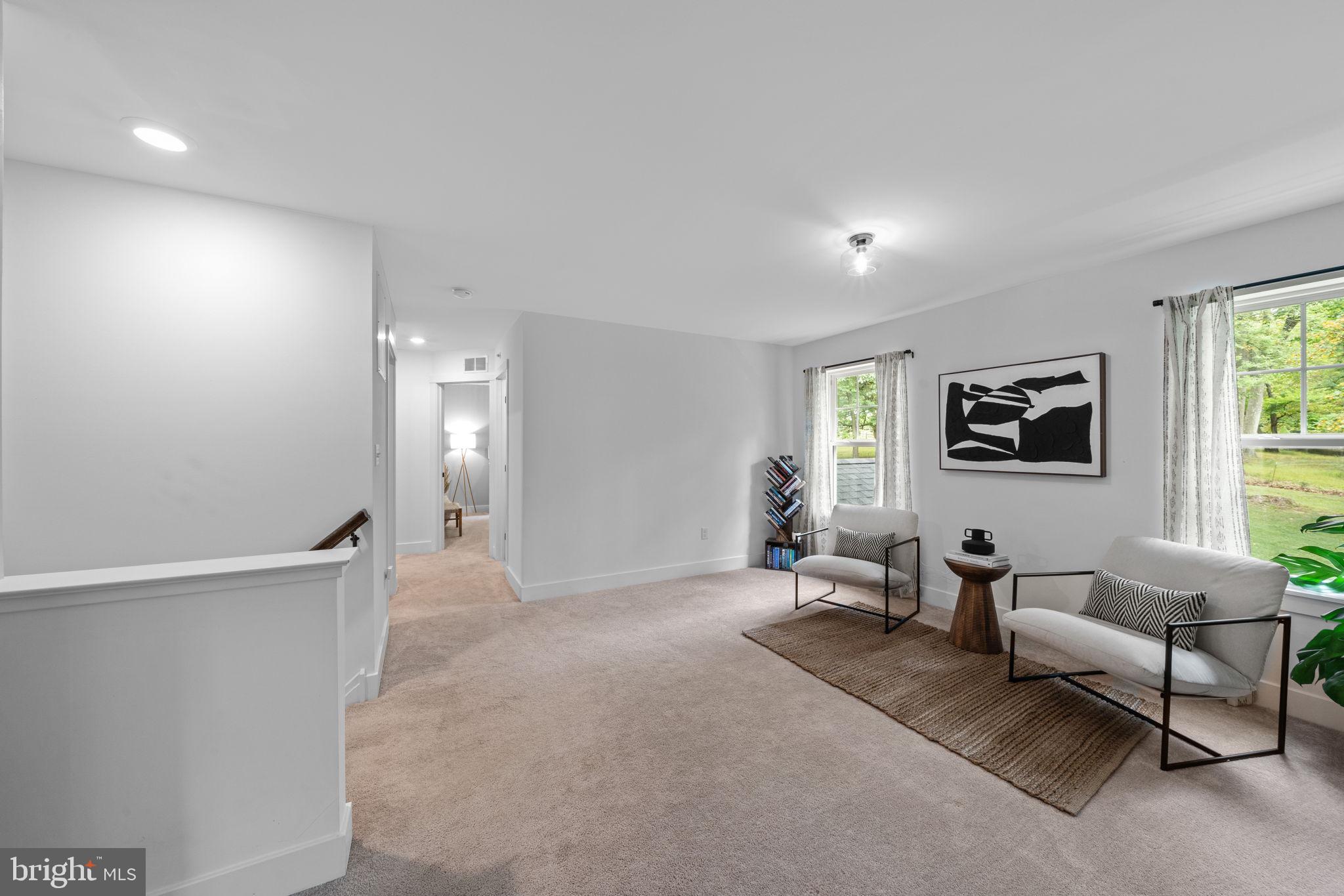 611 Grouse Road Exton, PA 19341 - Photo 25 of 59 a living room with furniture and a window