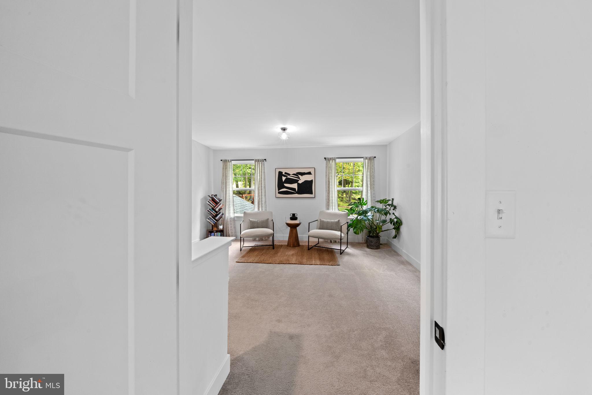611 Grouse Road Exton, PA 19341 - Photo 26 of 59 a view of a livingroom and a livingroom with furniture and a window