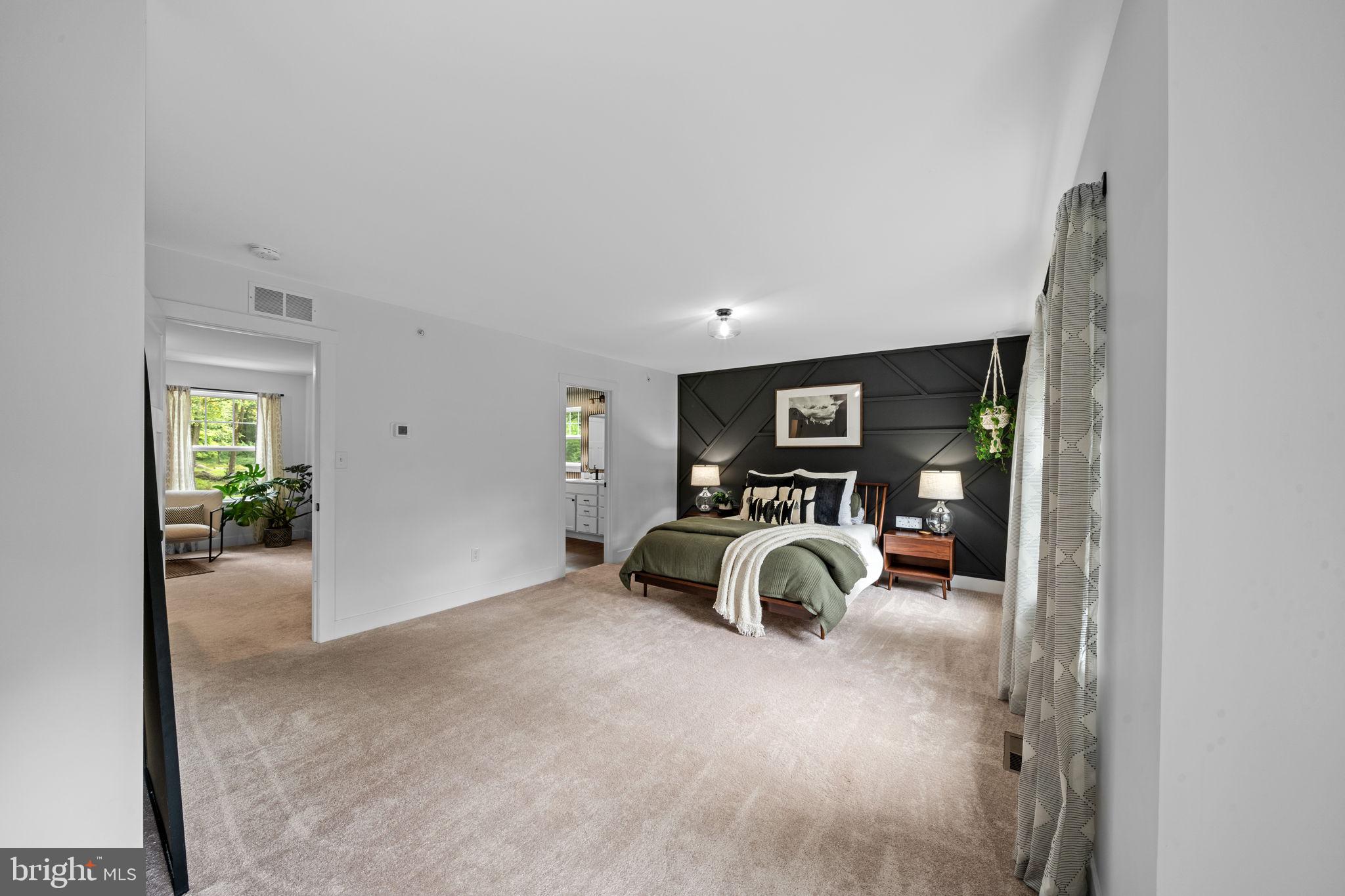 611 Grouse Road Exton, PA 19341 - Photo 28 of 59 a view of a livingroom with furniture and cars