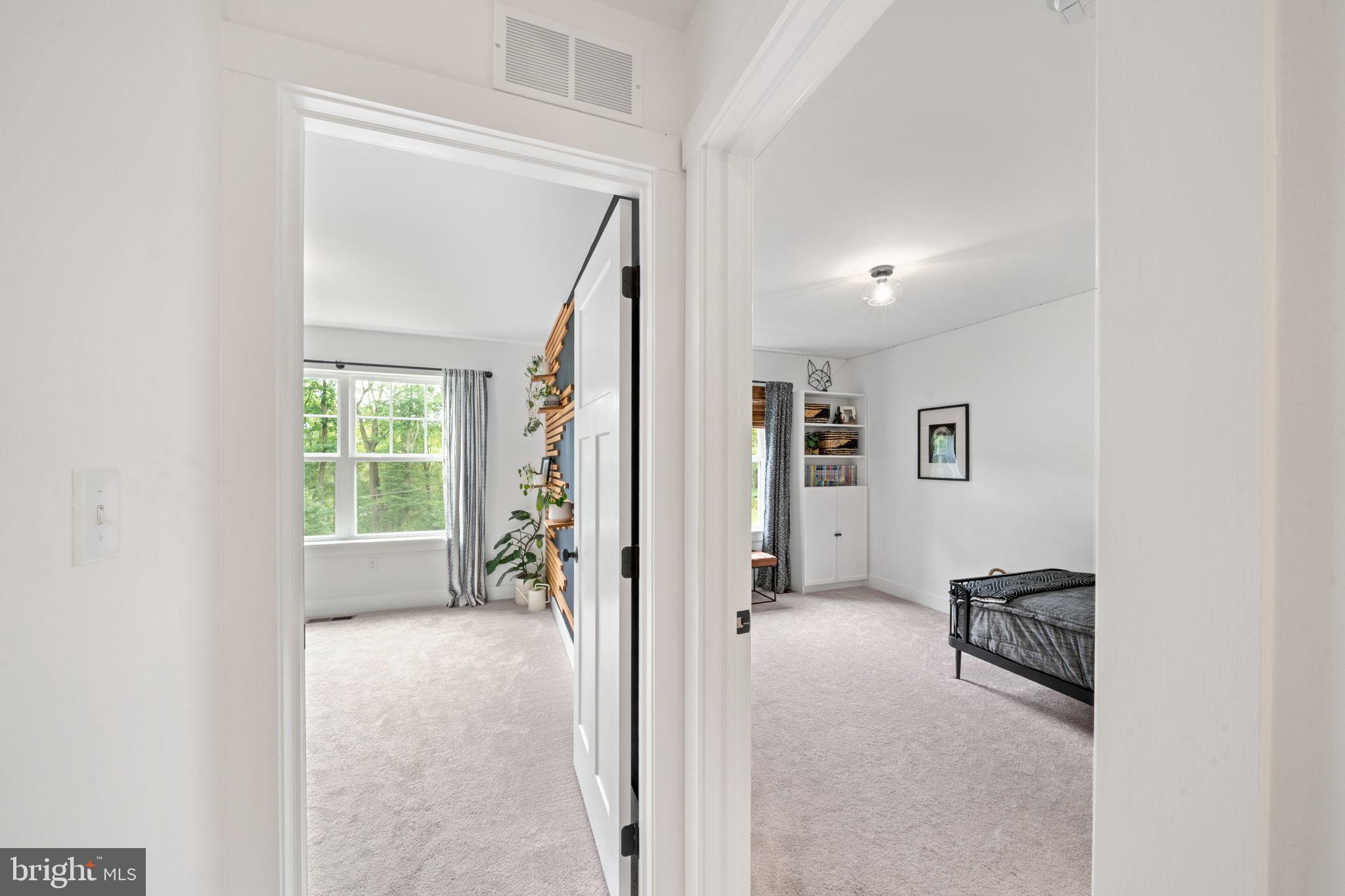 611 Grouse Road Exton, PA 19341 - Photo 40 of 59 a view of a livingroom with a furniture and a window